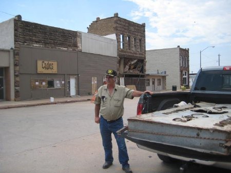DMAC Don Shilling in front of original location of sign